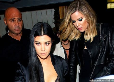 Kourtney Kardashian flashes nipple covers with Kendall Jenner